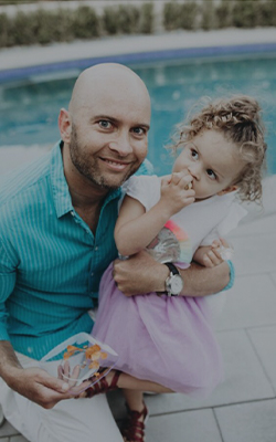 Dr. Steven with his kid. Dr. Steven with his kid.